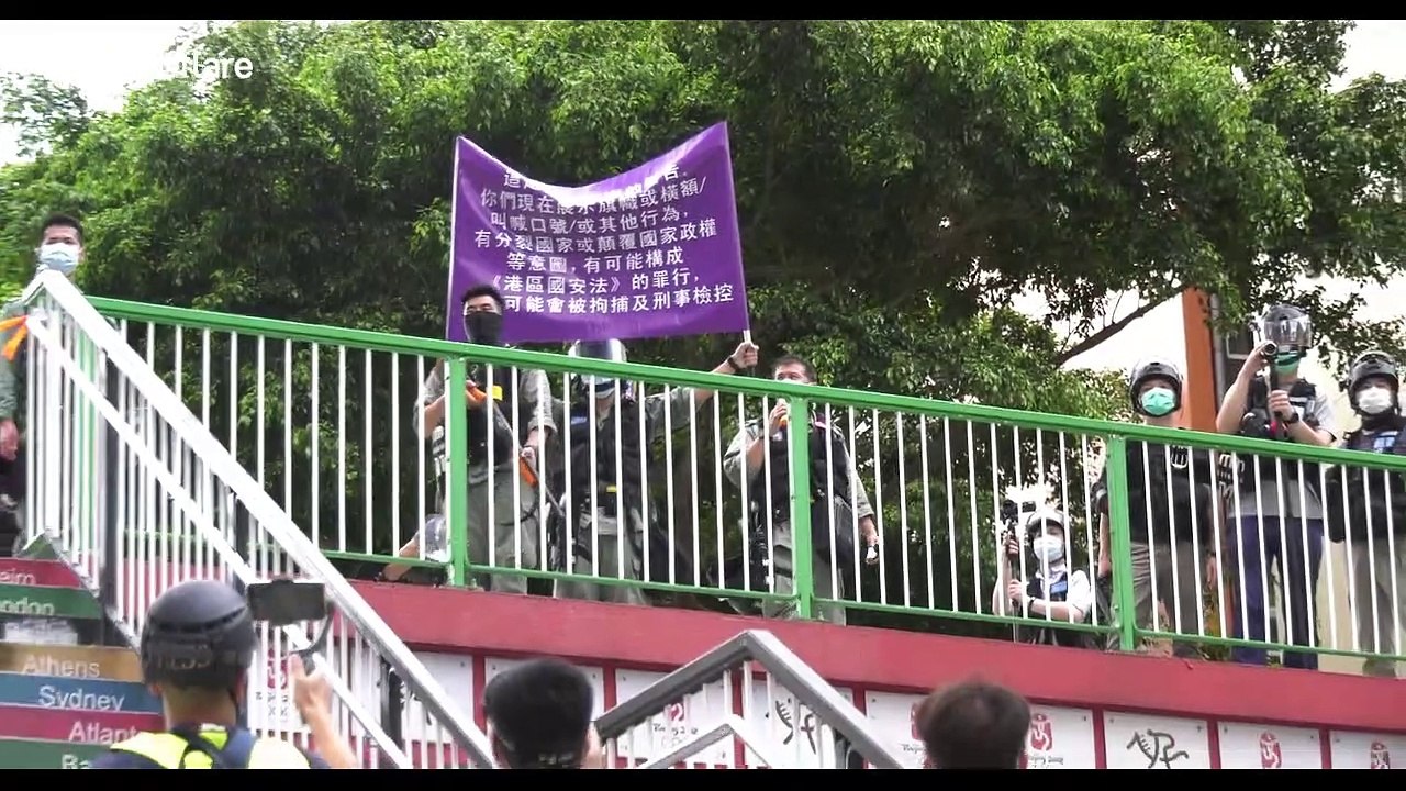 Dozens arrested as hundreds take to the streets of Hong Kong on first day under new security law