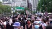 New York protesters gather outside city hall ahead of vote on budget