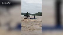 Floods submerge villages in eastern Thailand after heavy rain