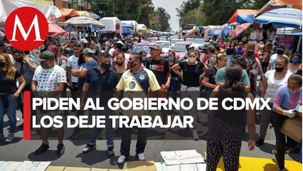 Comerciantes ambulantes protestan en Eje 1 Norte