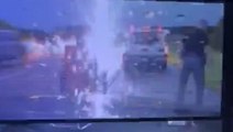 Lightning strikes dangerously close to police officer