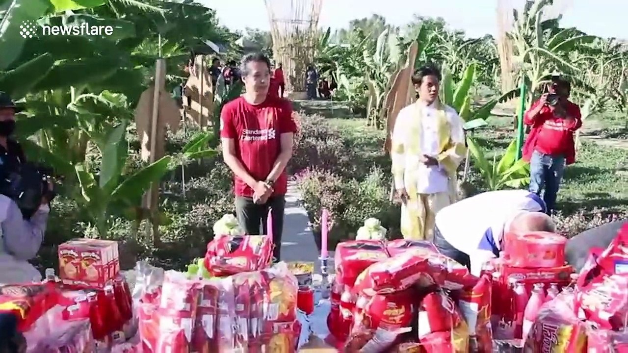Liverpool fans in Thailand celebrate Premier League title victory