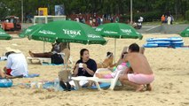 South Korea reopening: Domestic tourists flock to Busan's beaches