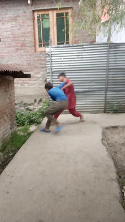 Two boys fighting with each other. Funny fight.. Must see... Follow and share plzz