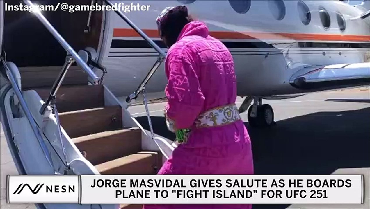Jorge Masvidal Gives Salute In Wild Bathrobe Before Boarding Flight To Fight Island