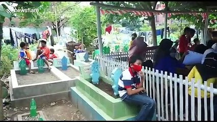 Emergency school built on grave site for Indonesian children