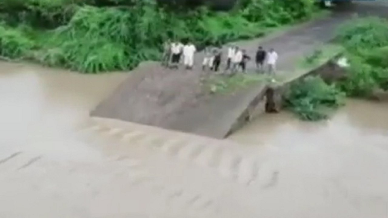 Heavy rain causes Bridge collapse, stadium truns into pond