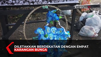 Larangan Buang Sampah Pakai Peti Mati