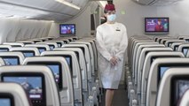 Qatar Airways Now Requires Passengers Wear a Face Shield and Mask
