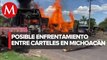 Enfrentamiento deja tres vehículos incendiados en carretera de Michoacán