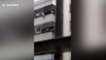 Chinese man climbs six floors barehanded to save girl hanging from window