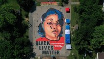 Artists And Volunteers Create Stunning Mural Of Breonna Taylor