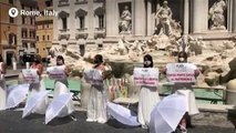 Women protest against postponed weddings
