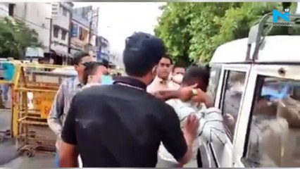 Download Video: MP cop slaps gangster Vikas Dubey on camera