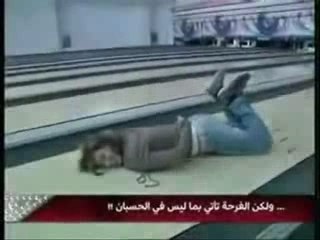 Lady Falls After Getting a Strike While Bowling