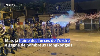 Pas de regrets: des policiers de Hong Kong blessés réaffirment leur engagement