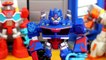 Transformers optimus prime  Rescue Bots save Dani Burns from imaginext Poison Ivy and Scarecrow
