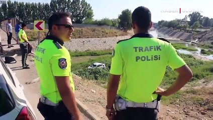 Dere yatağına devrilen otomobilin sürücüsü yaralandı