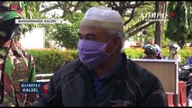 Petugas Gabungan TNI-Polri Razia Warga Tak Pakai Masker di Simpang Jalan Jenderal Sudirman