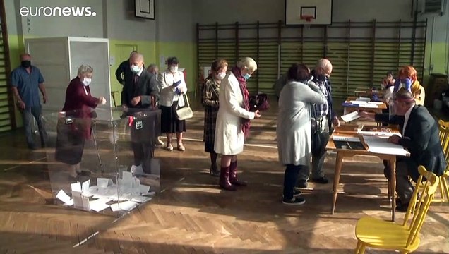 Poland election result: Narrow victory for conservative incumbent Andrzej Duda