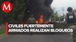 Civiles armados bloquean carretera y queman tráiler en Aguililla, Michoacán