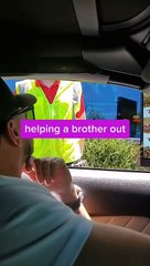 Man Helps Worker Protect Himself From the Sun