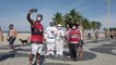 Brazilian couple wear space suits as virus protection