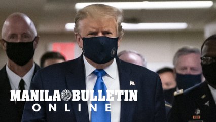 Trump appears in public with a face mask for the first time