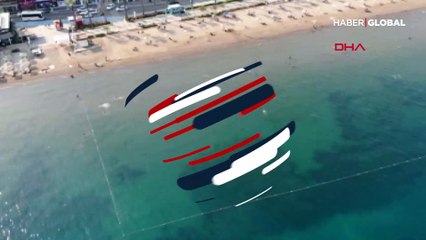 Marmaris'te halk plajında sosyal mesafeli deniz keyfi drone ile görüntülendi