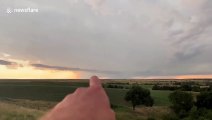 Storm chaser captures rainbow-filled sky after torrential downpour in South Dakota