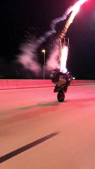 Professional Rider Wheelies with Fireworks