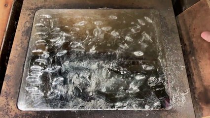 Skimming A Vat of Solder for Impurities