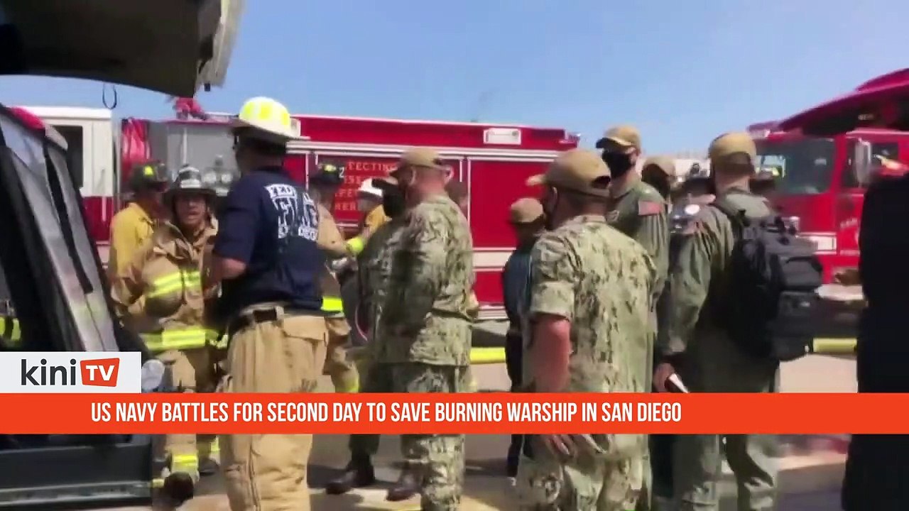 US Navy battles for second day to save burning warship in San Diego