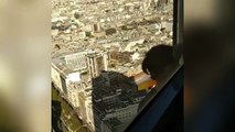 Daredevil climbs 689-foot Paris skyscraper