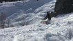 Skier Faceplants and Scorpions Into the Snow While Jumping off Rock