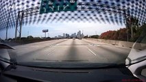 Dash cam captures sedan crashing into truck on Houston highway
