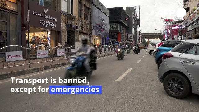 Millions face new virus curbs, but hope rises for US vaccine