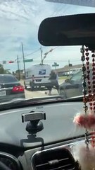 Mailman Stands His Ground in Street Fight