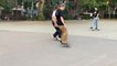 Skateboarding Duo Perform Synchronized Ollie