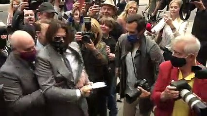 Johnny Depp and Amber Heard arrive on eighth day of trial