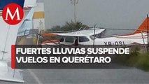 Viento arrastra avioneta en Aeropuerto de Querétaro; suspenden vuelos por lluvia