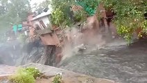 House collapses and washes away