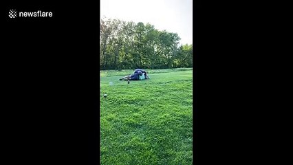 Strange golf bros get in intimate wrestling match in front of braying friends