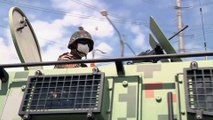Armoured trucks enforce Manila lockdown as Philippines responds to coronavirus case spike