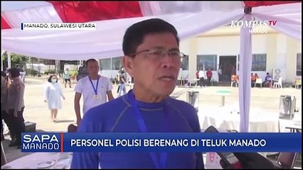 Puluhan Personel Polisi Berenang Di Teluk Manado