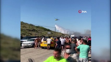 Ünlü tatil merkezi Alaçatı’daki yangın tatilcilere korku dolu anlar yaşattı