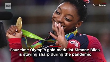 Pandemic can't stop Simone Biles' stunning aerial display