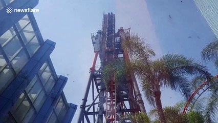 Terrifying moment rollercoaster broke down leaving screaming riders stranded 100ft off the ground