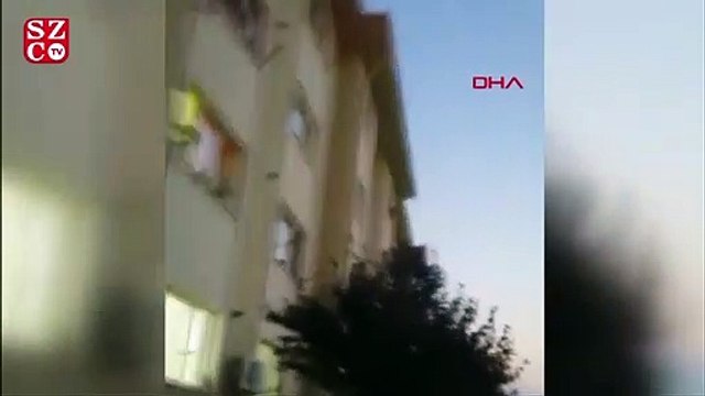 Çocuğunu pencereden sarkıtıp, Atayım mı diye bağıran kadını polis engelledi