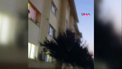 Çocuğunu pencereden sarkıtıp, "Atayım mı diye bağıran kadını polis engelledi